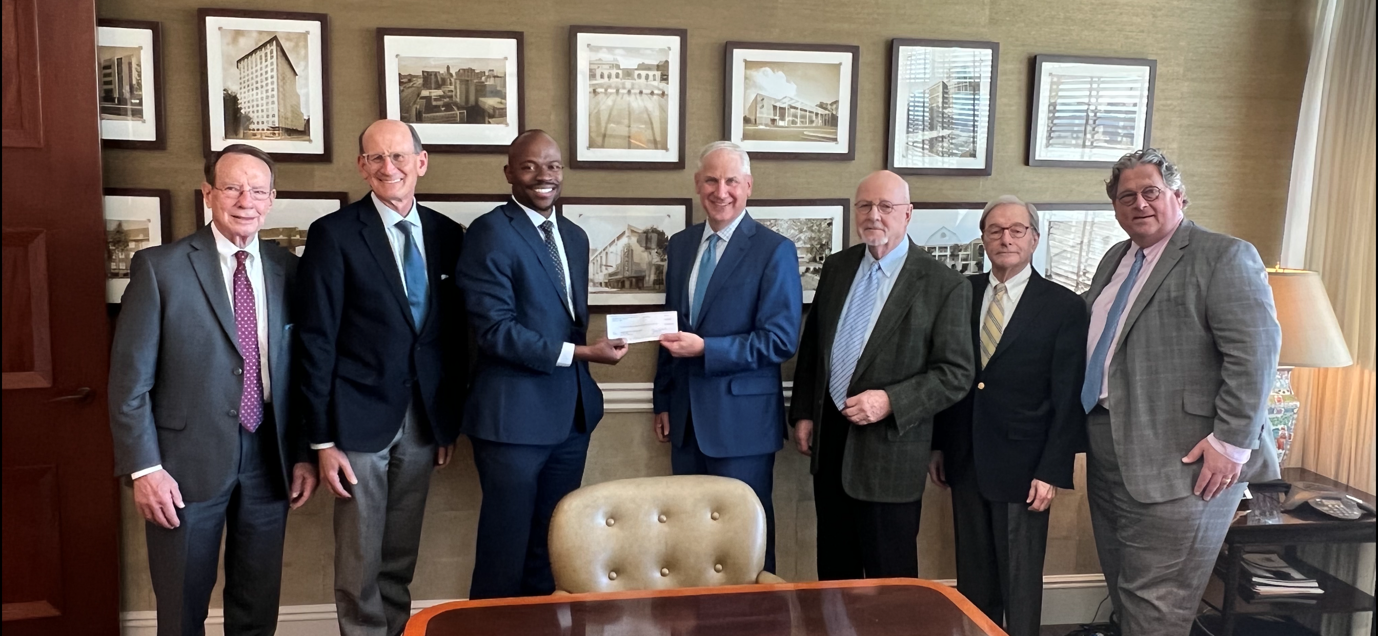 TUFF Board of Directors presents check to GSU President, Dr. Brian Blake.